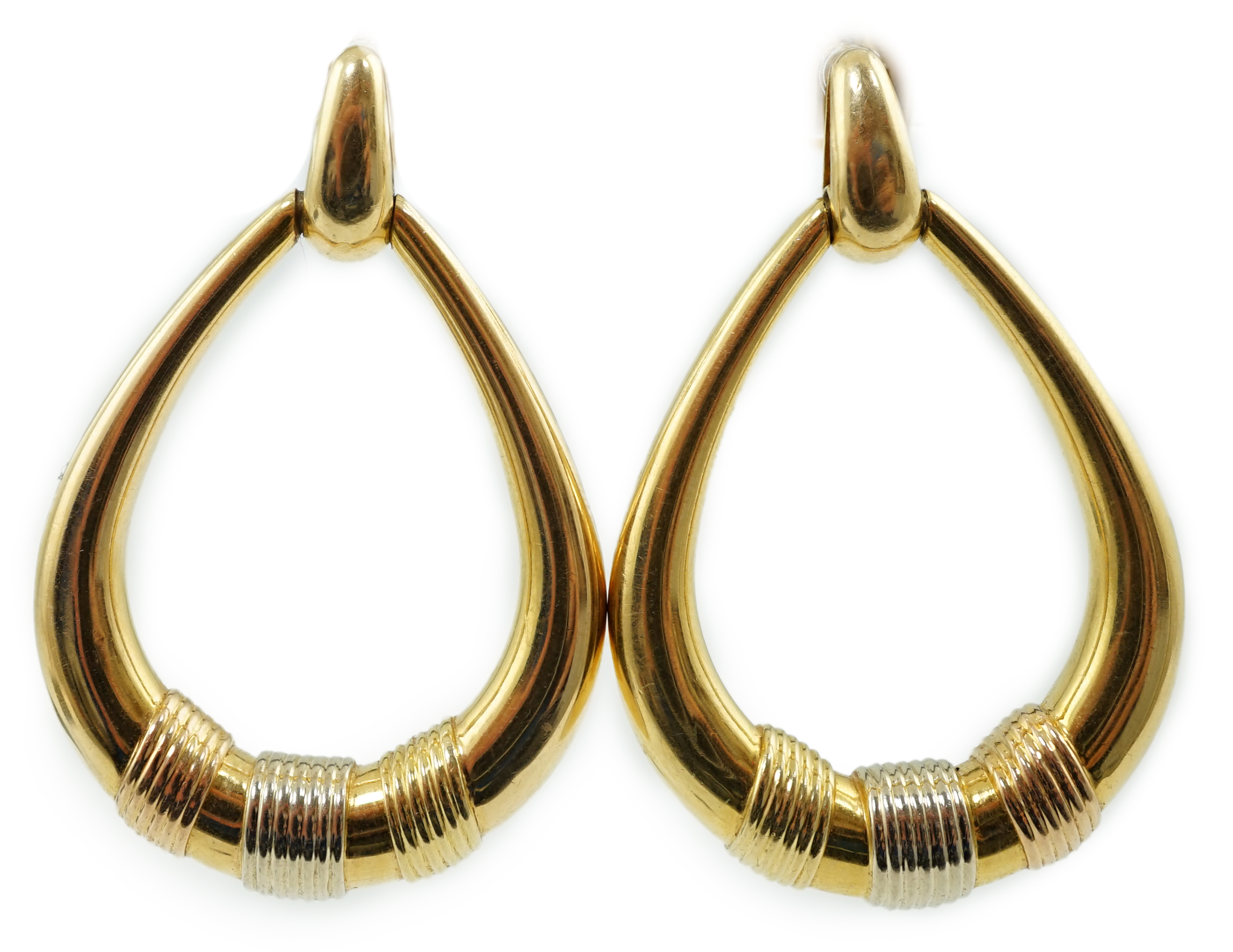 A modern pair of Cartier three colour 18k gold loop earrings